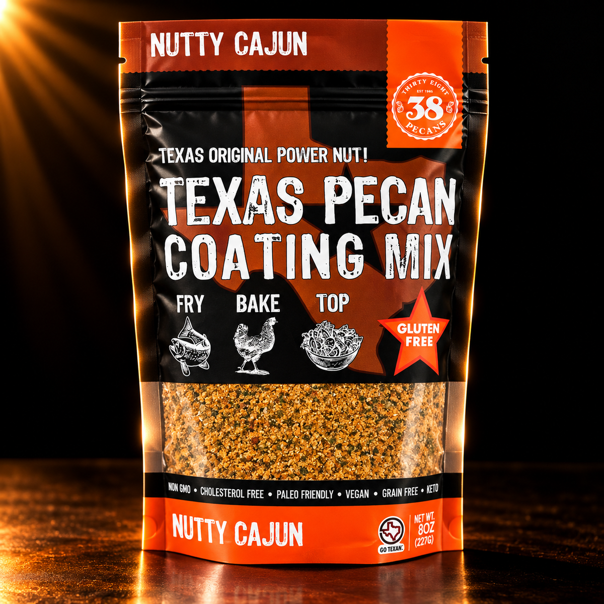 38 Pecans Nutty Cajun Pecan Coating Mix in its original black and orange 8 oz pouch, showing gluten-free Cajun-seasoned pecan breading against a dark background.